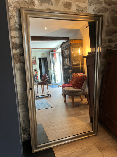 Ancienne porte, réhabilitée en miroir d'entrée